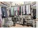 Organized walk-in closet with ample hanging space, shelves, and shoe storage at 10796 E Betony Dr, Scottsdale, AZ 85255