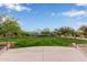 Well-maintained community lawn with lush landscaping, mature trees, and amenities for recreation and relaxation at 10796 E Betony Dr, Scottsdale, AZ 85255