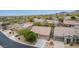 A front exterior view of a single-Gathering home with desert landscaping and a driveway leading to an attached two-car garage at 10796 E Betony Dr, Scottsdale, AZ 85255
