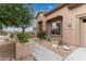 Exterior view of the home features a decorative window and number address above front door at 10796 E Betony Dr, Scottsdale, AZ 85255