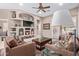 Inviting living room featuring a built-in entertainment center and neutral color palette at 10796 E Betony Dr, Scottsdale, AZ 85255