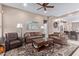 Comfortable living room boasts ample seating, neutral tones, and a decorative area rug at 10796 E Betony Dr, Scottsdale, AZ 85255