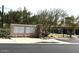 A ground-level image of a group of mailboxes in front of a community clubhouse surrounded by desert landscaping at 10796 E Betony Dr, Scottsdale, AZ 85255