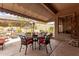 Inviting covered patio with comfortable seating and tasteful decor, perfect for outdoor enjoyment at 10796 E Betony Dr, Scottsdale, AZ 85255