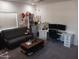 This cozy space features a couch, workspace, and decorations at 11219 N 165Th Ave, Surprise, AZ 85388