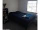 This bedroom has a neutral color scheme and includes a convenient window to the outside at 11219 N 165Th Ave, Surprise, AZ 85388