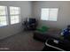 This bedroom has a neutral color scheme and includes a convenient window to the outside at 11219 N 165Th Ave, Surprise, AZ 85388