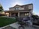 Charming two-story home with a well-maintained backyard and inviting covered patio at 11219 N 165Th Ave, Surprise, AZ 85388