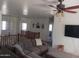 This is an upstairs living area with a sofa and media at 11219 N 165Th Ave, Surprise, AZ 85388
