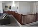 An upstairs living room featuring sofa, display furniture, and natural light at 11219 N 165Th Ave, Surprise, AZ 85388