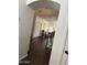 Inviting entryway leading into the living room and featuring modern flooring and elegant accents at 11219 N 165Th Ave, Surprise, AZ 85388