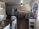 Spacious open-concept living and dining area with hardwood floors at 11219 N 165Th Ave, Surprise, AZ 85388