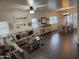 Spacious living room and dining area featuring modern decor, updated flooring, and plenty of space at 11219 N 165Th Ave, Surprise, AZ 85388