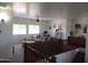 Upstairs living area offers comfortable seating and ambient natural light at 11219 N 165Th Ave, Surprise, AZ 85388
