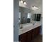 This bathroom is equipped with and sinks along with a glass door shower at 11219 N 165Th Ave, Surprise, AZ 85388