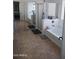 This main bathroom is equipped with a tub and a shower and also features a large mirror at 11219 N 165Th Ave, Surprise, AZ 85388