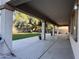 Spacious covered patio overlooking the lush backyard, ideal for entertaining at 11219 N 165Th Ave, Surprise, AZ 85388