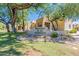 Welcoming community entrance with lush landscaping and desert-friendly plants in a vibrant setting at 11333 N 92Nd St # 2080, Scottsdale, AZ 85260