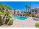 Relax by the community pool surrounded by lush palm trees and comfortable lounge chairs at 11333 N 92Nd St # 2080, Scottsdale, AZ 85260