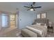 Cozy main bedroom featuring a ceiling fan, neutral palette, and ensuite bathroom access at 11333 N 92Nd St # 2080, Scottsdale, AZ 85260