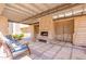 Stylish outdoor patio with a cozy fireplace and comfortable seating, perfect for entertaining at 11333 N 92Nd St # 2080, Scottsdale, AZ 85260