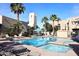Inviting community pool with spa, lounge chairs, and desert landscaping offering a resort-like feel at 11333 N 92Nd St # 2080, Scottsdale, AZ 85260