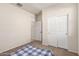 Bedroom offers natural light, carpeting, and a closet at 1178 E Tyler Ln, Casa Grande, AZ 85122