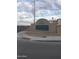 Sign for Sun Ridge Communities Resort Condominiums with desert landscape at 12123 W Bell Rd # 118, Surprise, AZ 85378