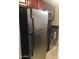 A well-equipped kitchen featuring a stainless steel refrigerator and oven at 12123 W Bell Rd # 118, Surprise, AZ 85378