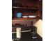 A well-organized kitchen with dishes, cookware, and a coffee maker at 12123 W Bell Rd # 118, Surprise, AZ 85378