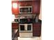 A well-equipped kitchen with stainless steel appliances and dark cabinets at 12123 W Bell Rd # 118, Surprise, AZ 85378