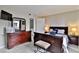 Inviting bedroom features a dresser, a queen-sized bed, and light flooring at 12123 W Bell Rd # 218, Surprise, AZ 85378