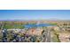 Stunning aerial view highlighting commercial property with a lake, fountain, and mountain backdrop at 12625 N Saguaro Blvd # 203, Fountain Hills, AZ 85268