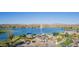 Breathtaking aerial view features lake, water fountain, playground, and beautiful mountainous terrain at 12625 N Saguaro Blvd # 203, Fountain Hills, AZ 85268