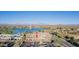 High aerial shot offering views of commercial buildings, a lake with fountain, and mountain landscape at 12625 N Saguaro Blvd # 203, Fountain Hills, AZ 85268