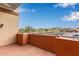 Balcony with a view of the neighborhood businesses and parking area at 12625 N Saguaro Blvd # 203, Fountain Hills, AZ 85268