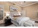 Comfortable bedroom with ceiling fan and natural light at 12625 N Saguaro Blvd # 203, Fountain Hills, AZ 85268