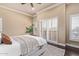 Relaxing bedroom with plantation shutters and hardwood floors at 12625 N Saguaro Blvd # 203, Fountain Hills, AZ 85268