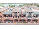 Exterior view of the property featuring private balconies and commercial units at the street level at 12625 N Saguaro Blvd # 203, Fountain Hills, AZ 85268