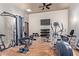 Spacious home gym featuring state-of-the-art equipment and a ceiling fan at 12625 N Saguaro Blvd # 203, Fountain Hills, AZ 85268