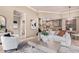 Bright and airy living room connecting to the kitchen and featuring neutral tones at 12625 N Saguaro Blvd # 203, Fountain Hills, AZ 85268
