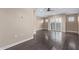 Bright living room featuring dark floors, neutral paint and large glass sliding doors at 12625 N Saguaro Blvd # 203, Fountain Hills, AZ 85268