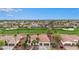 Aerial view of a home that backs up to a golf course in a well-maintained neighborhood at 13207 W Santa Ynez Dr, Sun City West, AZ 85375