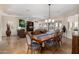 Open-concept dining room flows into living room and kitchen, perfect for entertaining at 13207 W Santa Ynez Dr, Sun City West, AZ 85375