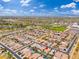 Aerial view of a neighborhood with schools, baseball fields, sports fields, and community resources at 14906 W Luna N Dr, Litchfield Park, AZ 85340