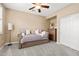 Comfortable spare bedroom with a daybed, dresser, and carpeted floors at 14906 W Luna N Dr, Litchfield Park, AZ 85340