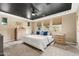 Spacious bedroom featuring a black ceiling, carpeted floors, and large windows for natural light at 14906 W Luna N Dr, Litchfield Park, AZ 85340