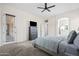 Spacious bedroom featuring carpeted floors and direct access to the backyard at 1528 E Harrison St, Gilbert, AZ 85295