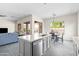 Open-concept kitchen flows into the dining and living areas, offering seamless entertaining at 1528 E Harrison St, Gilbert, AZ 85295