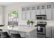 Modern kitchen features gray cabinets, sleek countertops, and stainless steel appliances at 1528 E Harrison St, Gilbert, AZ 85295
